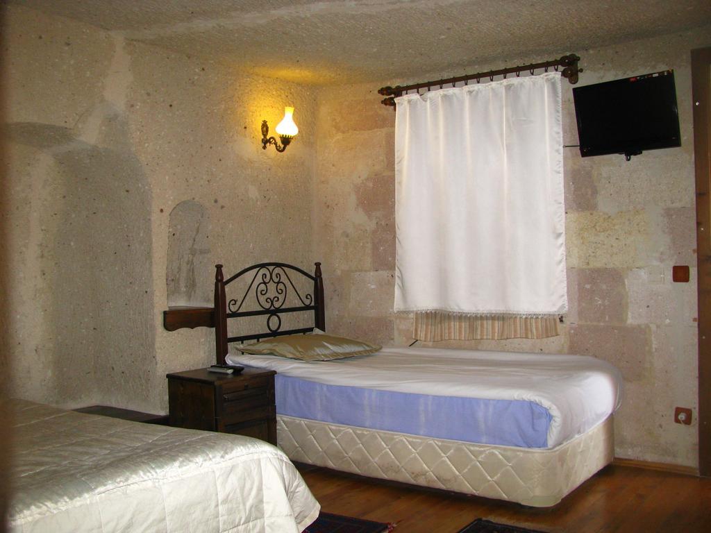 Nature Park Cave Hotel Гьореме Номер фото